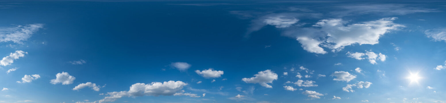blue sky hdri 360 panorama with white beautiful clouds in seamless projection with zenith for use in 3d graphics or game development as sky dome or edit drone shot for sky replacement