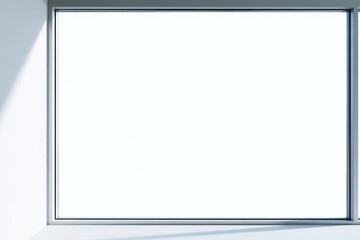 Obraz premium Clean, empty white frame with soft light and shadows, perfect for mockups. A minimalist interior scene featuring a large, blank white frame bathed in gentle light and subtle shadows, ideal for display