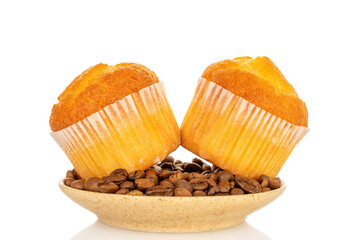 Sweet cupcakes with coffee beans  isolated on a white background, close-up.