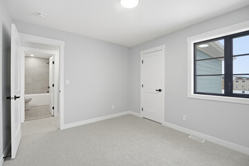 Bathroom is next to a bedroom