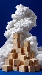 Conceptual scene of wooden blocks forming a structure against a backdrop of fluffy clouds, symbolizing cloud computing