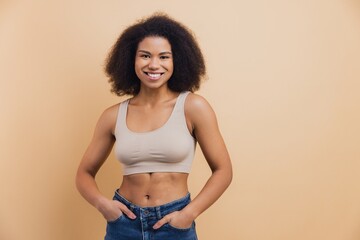 Young African American woman smiling looking at camera