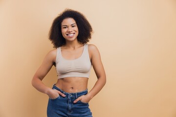 African American woman smiling wearing comfortable casual outfit