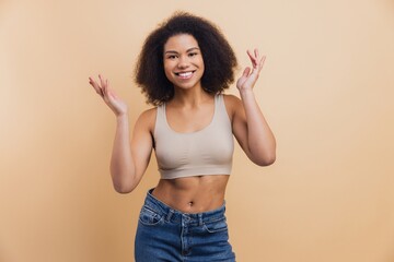 Young African American woman smiling expressing happiness