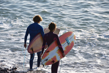 Surfers in Arguineguin, Gran Canaria, Canary Islands