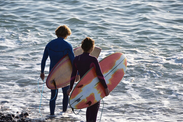 Surfers in Arguineguin, Gran Canaria, Canary Islands