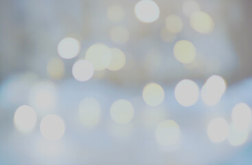 Abstract cool toned bokeh background with soft blurred light circles creating a clean modern atmosphere, ideal for web design, presentations, festive layouts, minimal graphics and visual projects