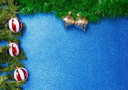 Christmas ornaments, beautiful Christmas decorations positioned on colored EVA foam, selective focus, top view.