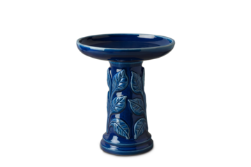 High-Quality Product Photograph of an Ornate Blue Ceramic Bird Bath with Leaf Detail, isolated on transparent background