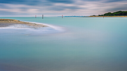 summer sunrise over the lagoon meets the sea, Bibione Pineda, Venice, Italy