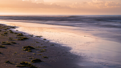 summer sunrise over the lagoon meets the sea, Bibione Pineda, Venice, Italy