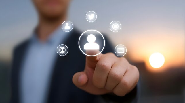 A businessman touches a digital interface with social media icons at sunset representing connection and strategy - Powered by Adobe