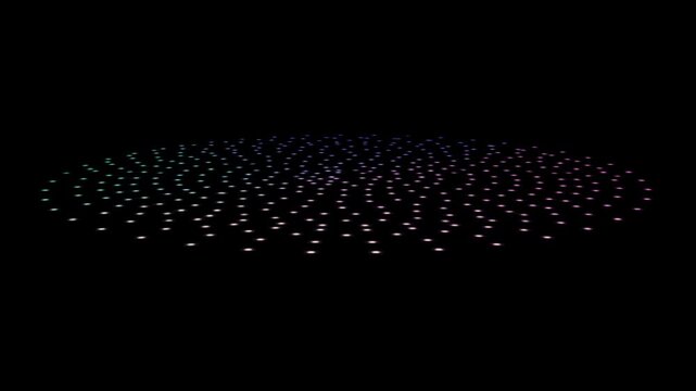 Array of colorful dots morphs and shifts on black. Abstract, dynamic, futuristic motion graphic