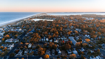 Aerial view of the town on the ocean. Beach town. Coastal town. Autumn on the beach. Summer sunset on the ocean beach. 