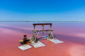 Fototapeta premium Specialized equipment for harvesting table salt from the lake.