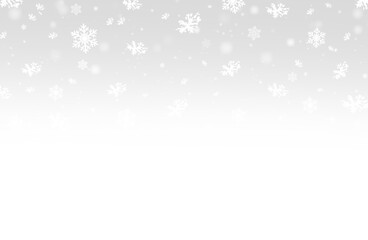 Beautiful winter snowfall with delicate flakes against a soft grey backdrop