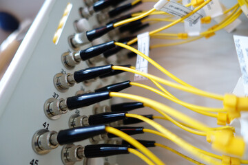 Close-Up of Yellow Cables and Connectors Setup
