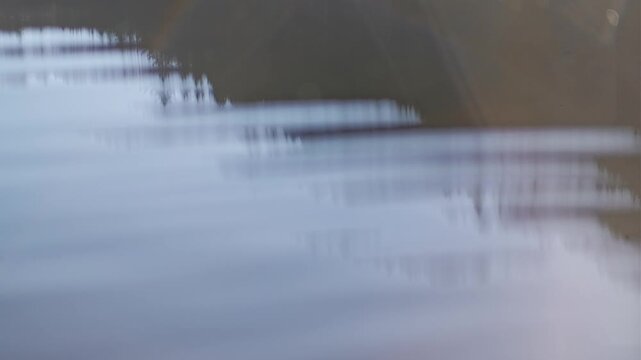 Abstract dreamy lake reflection with atmospheric lens flare effects