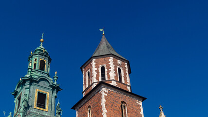 Decorations of Wawel Cathedral. The tops of the architectural buildings of Wawel Cathedral and the bell tower