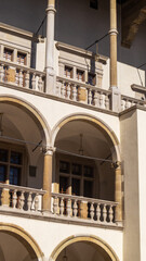 Balconies in the palace courtyard. Walls with balconies inside the palace courtyard