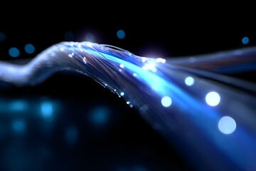 Close-up of Blue-Lit Fiber Optic Cables in Motion