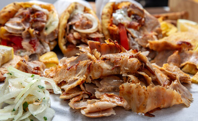 Gyro sliced meat closeup, doner shawarma wraps, traditional greek street food