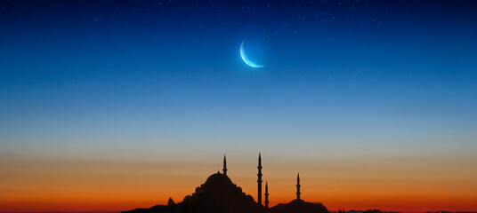 Muslim mosque silhouette and the moon in the night sky. Ramadan festive, islam religion.