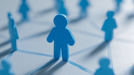 Blue human-shaped figures connected by lines representing social networking concepts and interpersonal relationships across a digital communication grid