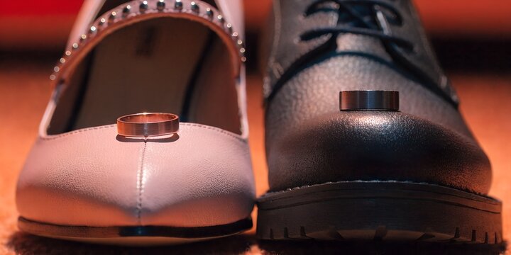 counple rings  on their shoes - Powered by Adobe