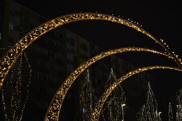 Christmas decoration on the streets in snow at night
