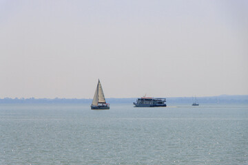 BALATONFURED, HUNGARY. Yacht and touristic ship on Balaton lake, Hungary.