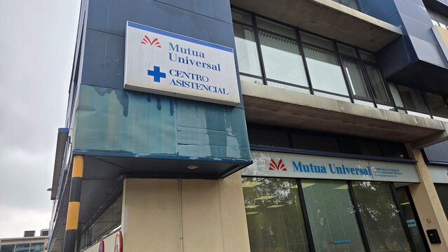 MADRID, SPAIN - NOVEMBER, 17, 2025. Mutua Universal, a Mutual Society that collaborates with the Social Security. Healthcare center exterior with mutua universal signage