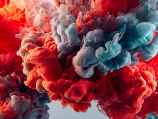 Fototapeta premium Vibrant red and blue ink swirling and mixing in water creating a dynamic colorful cloud pattern with intricate flowing textures and abstract shapes