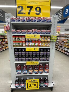 Grocery Store Jif peanut butter Smuckers jelly display and prices