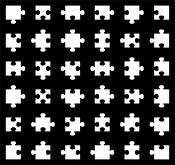 Collection of different puzzle pieces on black background