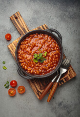 Baked beans stew tomato sauce parsley skillet bowl vegetarian British side dish