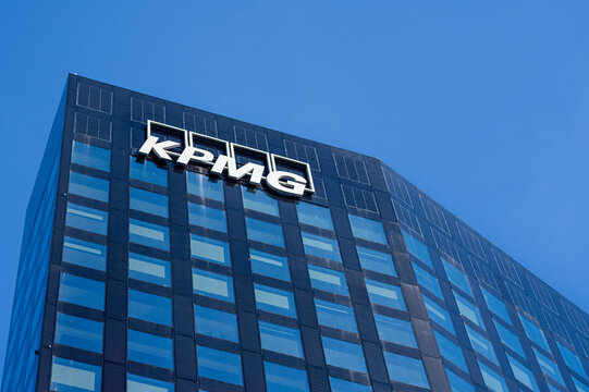 Milan, Italy - November 9, 2025: KPMG company specializes in providing audit, tax, and advisory services to businesses, governments, and non-profit organizations around the globe.
