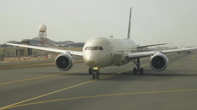 sunny day abu dhabi city international airport ready to departure line aircraft passenger side window panorama 4k united arab emirates