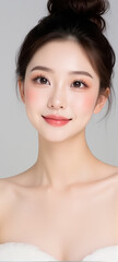 Female Asian Model with Short Hair - Young Beautiful Woman with Hair Bun - Studio Portrait of Asian Beauty for Fashion, Cosmetic, Skincare - Posing on White Background - Smooth Tied Hair