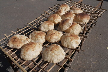 Cairo,Egypt - December 3, 2025: Freshly baked breads at a bakery  in Cairo