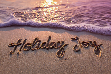 Holiday Joy Naturally Handwritten in Smooth Wet Sand with Shimmering Waves and Warm Golden-Hour Sun at Horizon &ndash; perfect for seasonal greeting cards