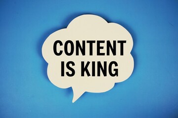 Content Is King text with speech bubble top view on blue background