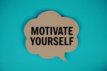 Motivate Yourself text with speech bubble top view on blue background