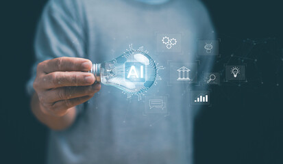 Artificial intelligence innovation concept. Hand holding light bulb with AI interface and digital icons. Machine learning, automation, data analysis, creativity, and future business solutions.