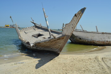 Detail and closeup of old and colored boat wooden hull, 