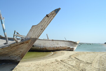 Detail and closeup of old and colored boat wooden hull, 