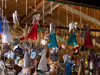 Colorful Glass Angel Ornaments Hanging at Holiday Market
