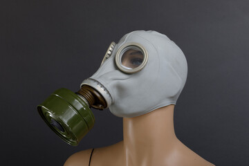 Vintage Soviet Gas Mask on Mannequin, Grey Studio Background