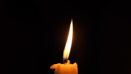 Candle Flickers Through Stormy Darkness, Gentle Flicker Symbolizes Strength In Shadowed Darkness, Wavering Candle Flame Showcases Resilience During Storm And Power Loss Situations