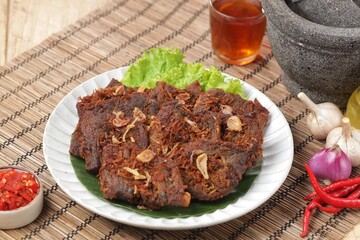 Empal daging sapi. Empal beef is a typical Indonesian food made from processed beef and cooked with spices.